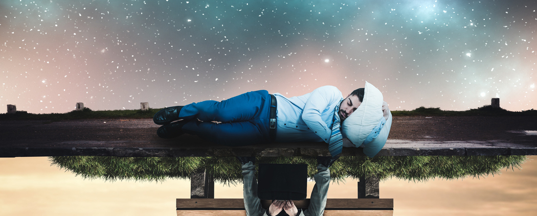 Man sleeping and working